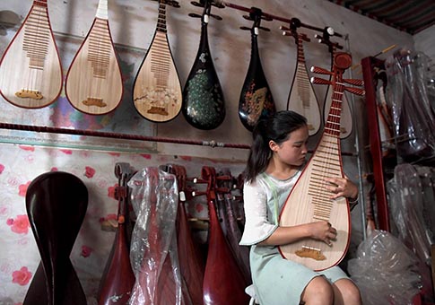 Producción de instrumentos musicales en Xuyang, Henan