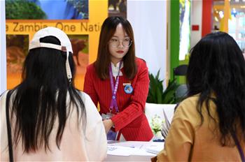 Los voluntarios en el Centro Nacional de Exposiciones y Convenciones en Shanghai