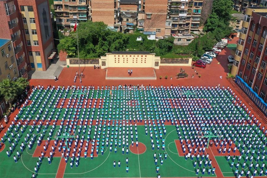 Todos los estudiantes de secundaria en Guiyang reanudan clases en el campus