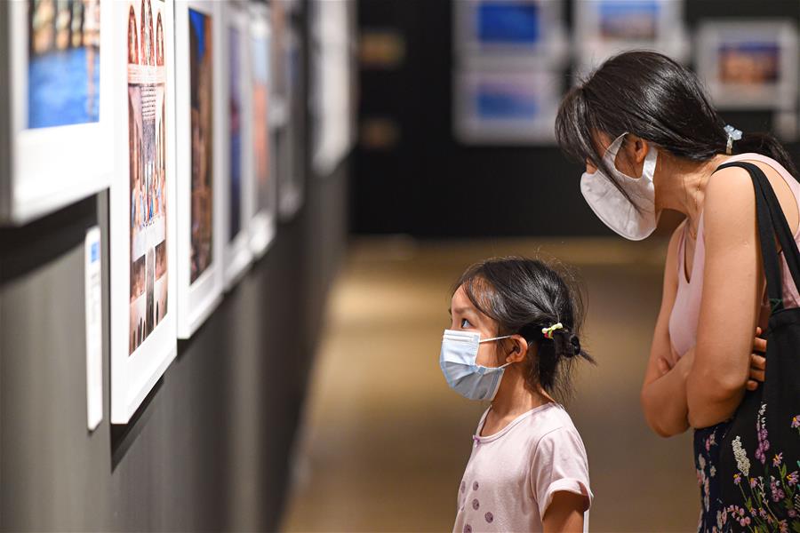 Exposición de arte de fotografía del patrimonio cultural mundial en Museo de Hainan