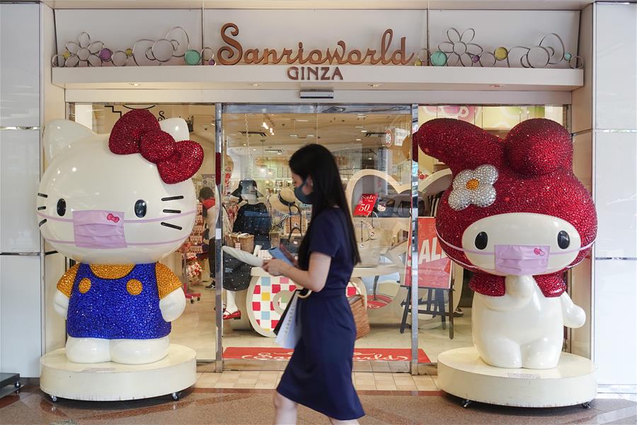 Personas portan mascarillas en Tokio, Jap&oacute;n