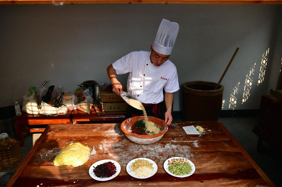 Zhang Xu, chef de panadería de pasteles de luna en Henan