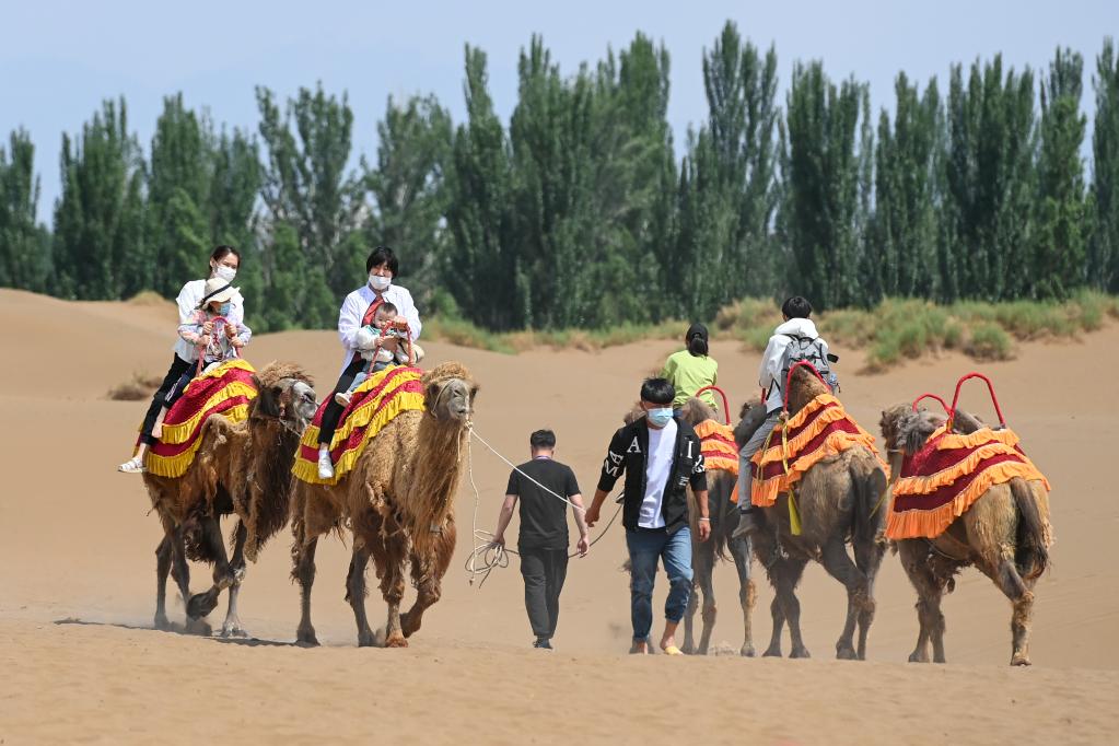 Xinjiang: Turismo en desierto de Kumtag