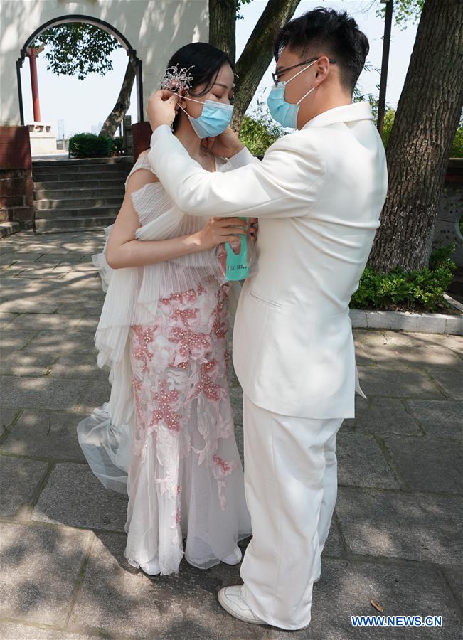CHINA-HUBEI-WUHAN-MATRIMONIOS-REANUDACION