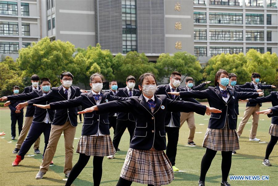 CHINA-SHANGHAI-ESCUELA-REANUDACION